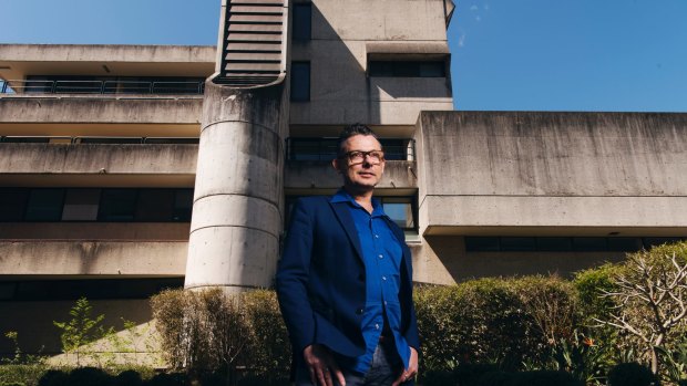 Architect Glenn Harper outside his favourite piece of Brutalist architecture, the former Bidura Children's Court in Glebe.