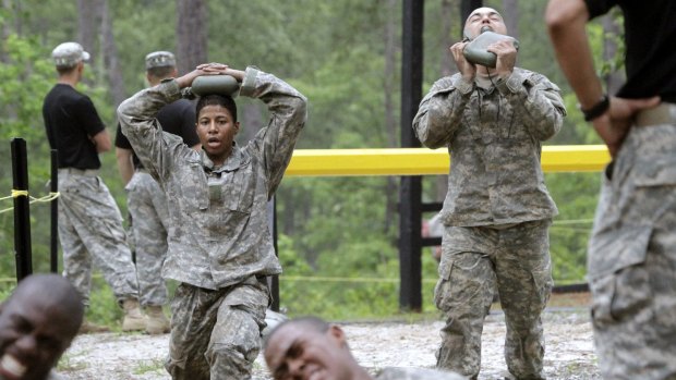 Training at the Ranger School - a woman undergoing in April one of the toughest obstacle courses in US Army training.