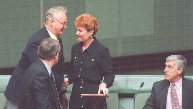 Senator Hanson is congratulated after her 1996 maiden speech in which she said Australia was in danger of being swamped by Asians.