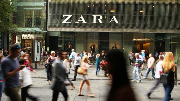 Shoppers walk past a Zara fashion store, operated by Inditex SA, at Pitt Street Mall in Sydney.