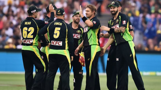 Bowled well ... Shane Watson reacts after James Faulkner takes a catch to dismiss Rohit Sharma.