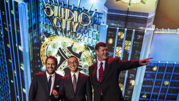 James Packer at last year's grand opening of Melco Crown's mega Macau casino, Studio City, with filmmaker Brett Ratner (left) and Macau casino billionaire Lawrence Ho (middle). 