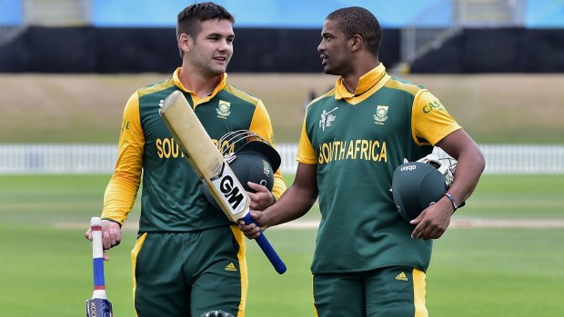 South Africa's Rilee Rossouw (L) and Vernon Philander walk from the field after winning their warm-up game against Sri Lanka.