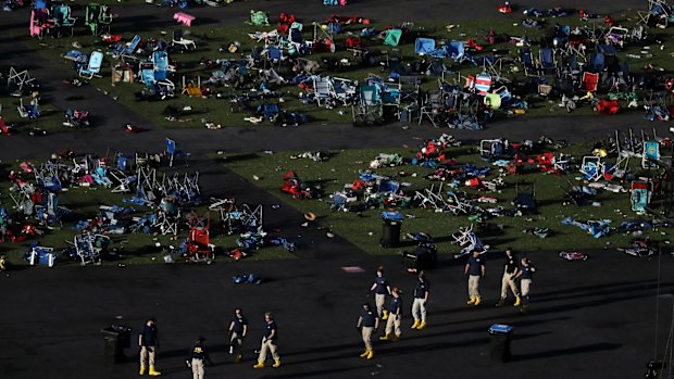 Investigators work at a festival grounds across the street from the Mandalay Bay Resort and Casino from where the gunman conducted the worst mass shooting in modern American history. 