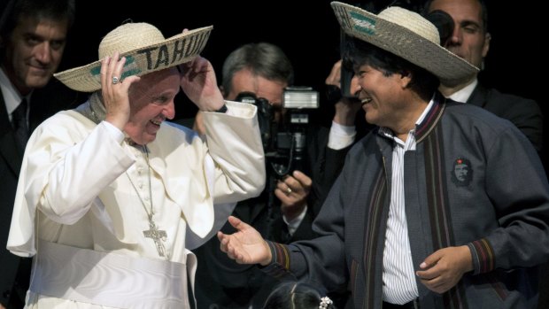 Pope Francis and Bolivia's President Evo Morales model traditional Bolivian hats at the second World Meeting of Popular Movements in Santa Cruz, Bolivia, where the Pope gave an empassioned address to delegates.