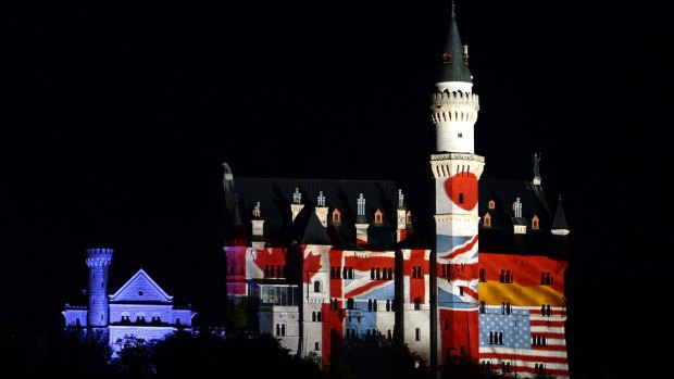 The castle Neuschwanstein near the small Bavarian village Fuessen, southern Germany, displays the national flags of the G7 countries ahead of the G7 summit at Elmau Castle.