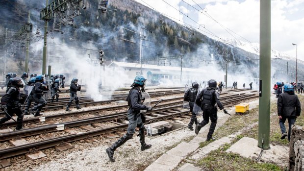 Riot police clash with protesters during a rally against the Austrian government's planned re-introduction of border controls at the Brenner Pass border crossing to Italy in 2016.