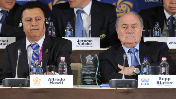 Alfredo Hawit of Honduras, left, interim head of CONCACAF and former FIFA president Sepp Blatter sit next to each other at a conference in May, 2012. Hawit has been arrested by Swiss police as part of the bribery investigation into FIFA.