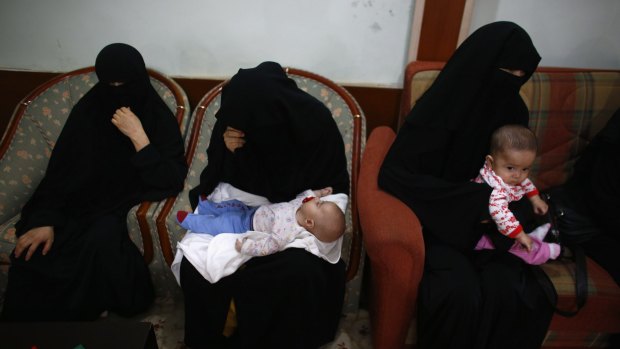 Uighur women and children in Istanbul in July, after fleeing from China where they say they were persecuted. 