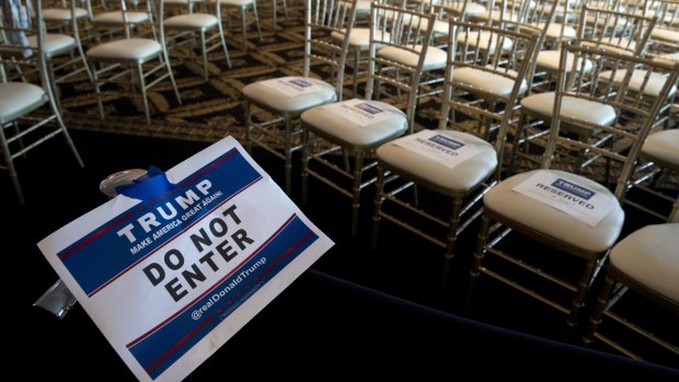 Separating the press from the invited guests at a Trump news conference in New York this week. 