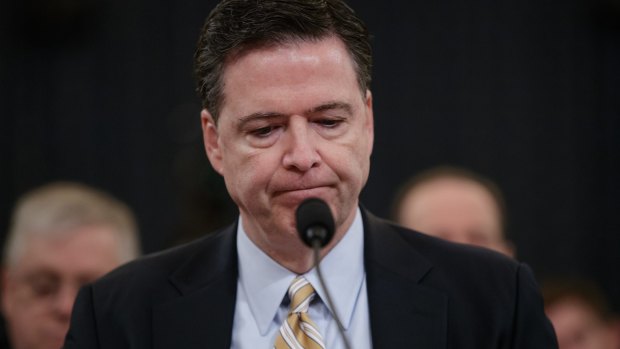FBI Director James Comey pauses as he testifies on Capitol Hill in Washington on Monday.