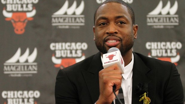 Chicago Bulls player Dwyane Wade speaks during a news conference in July.