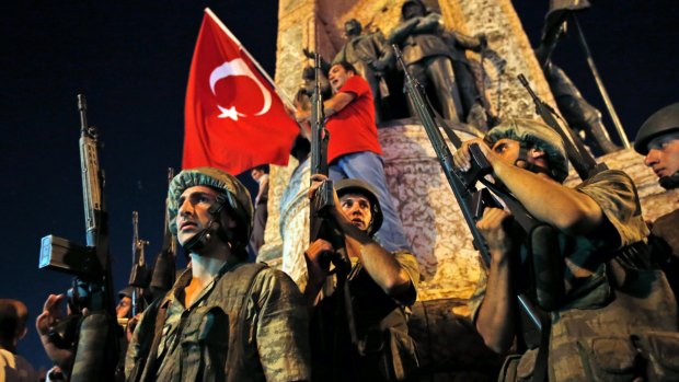 Turkish soldiers secure Istanbul's Taksim square as supporters of Turkey's President Recep Tayyip Erdogan protest in July after a failed coup.