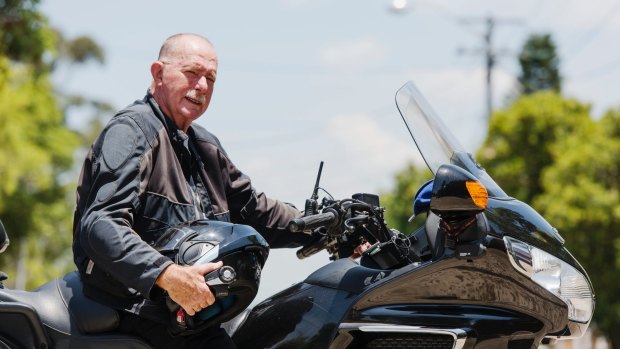 David Williams, 69, is secretary of the Sydney chapter of the Ulysses Club, Inc. shown with his motorbike. 