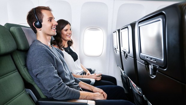 Seat width is more than adequate but leg-room is limited in Qantas' Boeing 747 economy cabin.