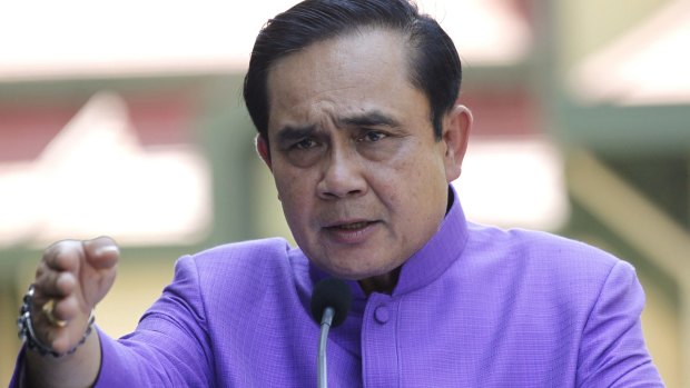 Thailand's Prime Minister Prayuth Chan-ocha: "Please explain to foreign countries or they may think I am intoxicated with power,"
