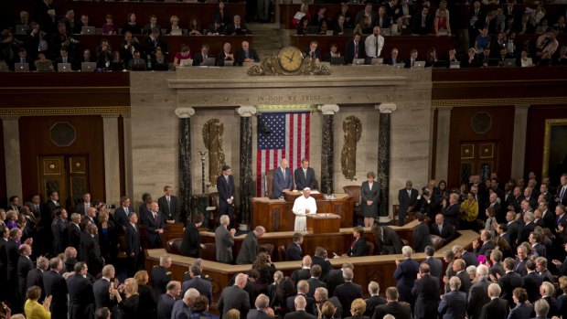 Pope Francis receives one of many standing ovations as he addresses Congress.