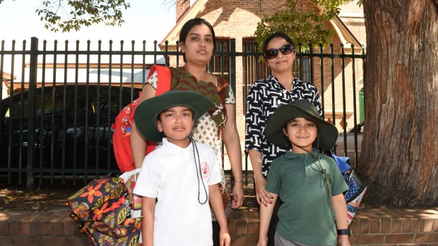 Mothers Deephi Devineni and Shaheen Lalani with their sons who attend Parramatta Public School.
