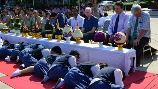 Students pay respect to teachers during a ritual  on June 26 2015.  Peter Dundas Walbran is third from right in the blue short-sleeved shirt.  