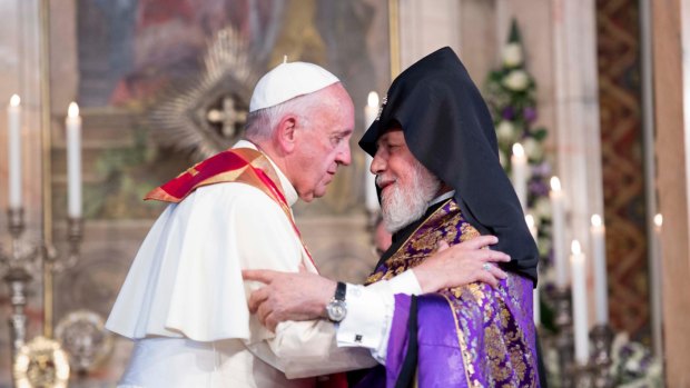 Pope Francis greeted by Catholicos Karekin II, right, as he visits the Apostolic Cathedral of Etchmiadzin in Yerevan on Friday. 