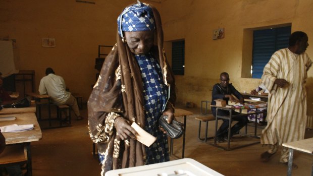 Casting a ballot in Niamey on Sunday. 