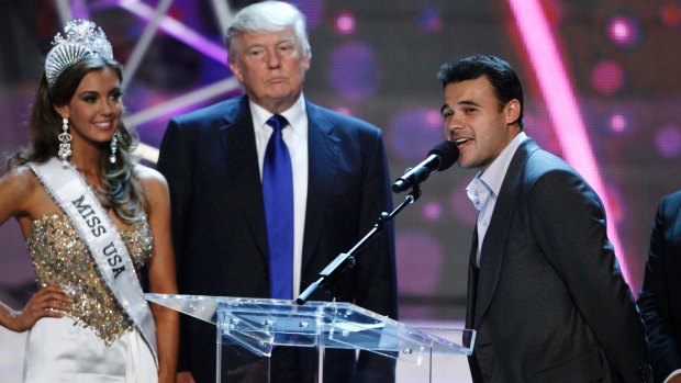 Miss USA 2013 Erin Brady and Donald Trump look on as Russian singer Emin Agalarov, right, speaks during a news conference in Las Vegas.