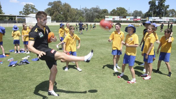 Richmond midfielder Anthony Miles at a football clinic in Albury on Tuesday. 