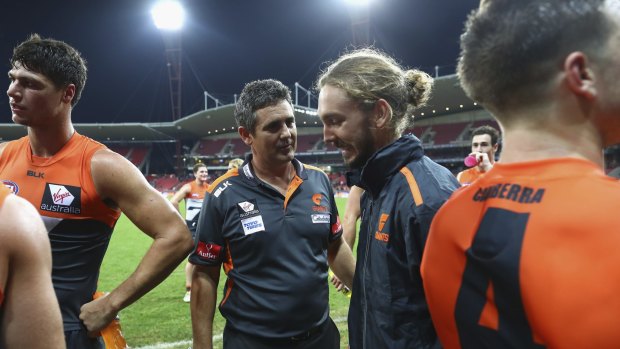 Consoling words: Giants coach Leon Cameron speaks to Matthew Buntine after the win over the Bulldogs.