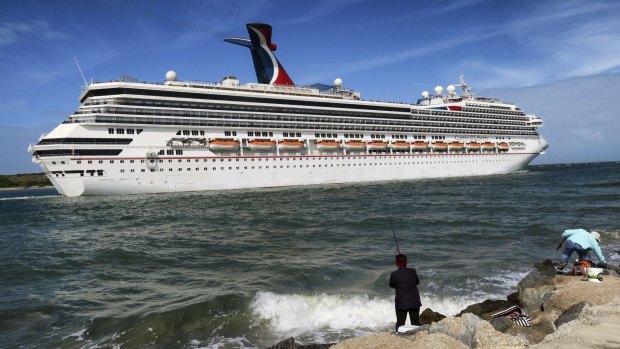 Carnival Liberty leaves Port Canaveral in Florida. Most major cruise lines have already suspended operations, but many countries are now refusing to allow ships to dock.