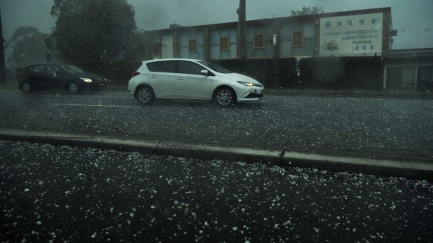 Hail falls in Hornsby on Saturday afternoon.
