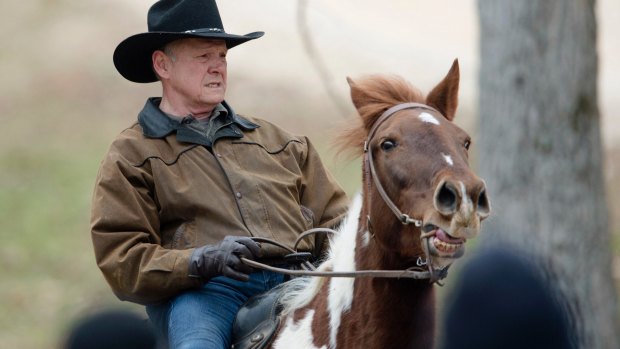 Republican nominee Roy Moore, who rode a horse to a polling station to cast his ballot, has refused to concede defeat.