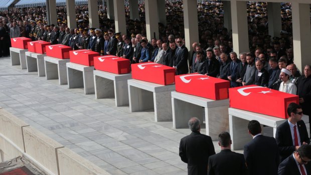 An imam recites funeral prayers for the victims of Wednesday's explosion in Ankara.