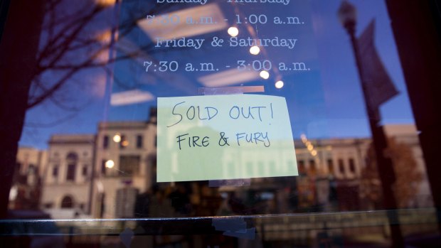 Sold out: a sign posted at the door for Kramerbooks & Afterwords Cafe in Washington.
