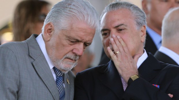 Brazilian Vice-President Michel Temer, right, talks with Defence Minister Jaques Wagner on Tuesday.