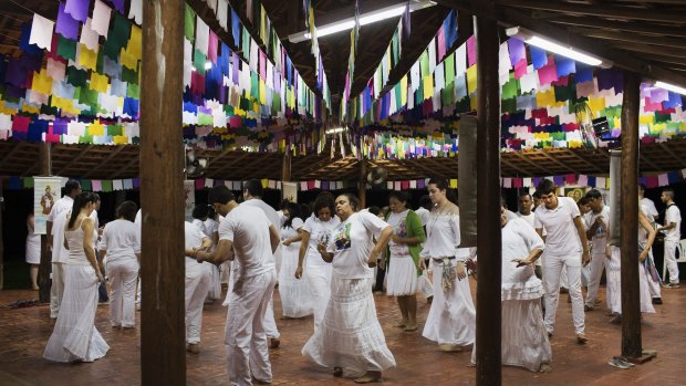 Prisoners on short release join a dance at a temple after consuming ayahuasca, a psychedelic drink used in various religions, in Ji-Parana, Brazil,