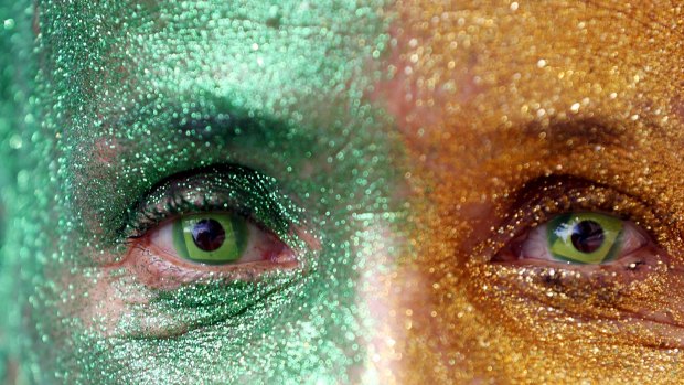 A demonstrator wears Brazilian flag contact lenses at a protest against Brazil's President Dilma Rousseff on Sunday.