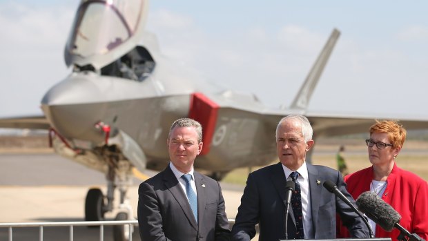 Defence Industry Minister Christopher Pyne, Prime Minister Malcolm Turnbull, and Defence Minister Marise Payne speak to the media after inspecting a Joint Strike Fighter at Avalon Airshow in March.