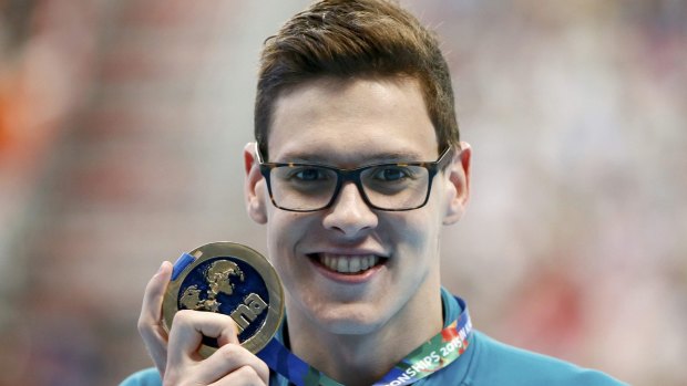 Mitch Larkin shows off his gold medal.