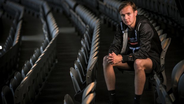 Ex-tennis prodigy Jackson Ross was attracted to the team aspects of footy