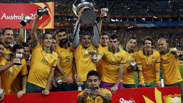 Relaxed: Australia's Massimo Luongo (front) takes a selfie with his teammates.