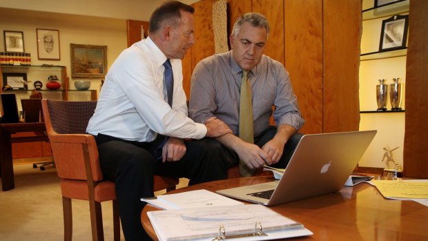 On Tuesday, Abbott and Hockey took part in a contrived photo opportunity pretending to go over drafts.
