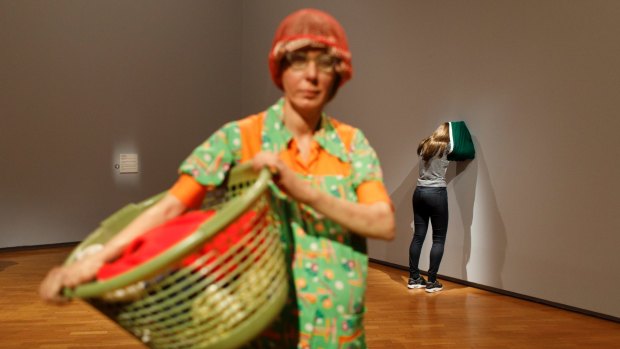 'Woman with a laundry basket' by American artist Duane Hanson. 