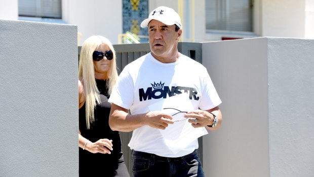 Jeff Fenech reads a statement outside his Five Dock home on Wednesday.
