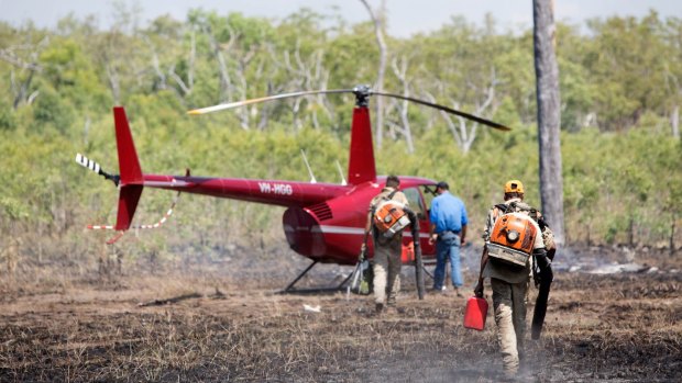 Rangers control a wildfire in the southern area of the Warddeken Indigenous Protected Area, close to Kakadu.