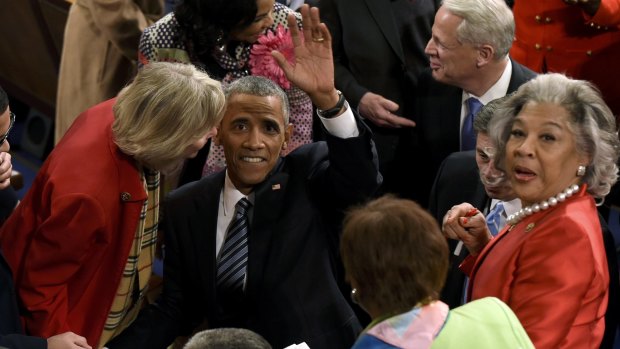 President Barack Obama waves from the House floor after the address.