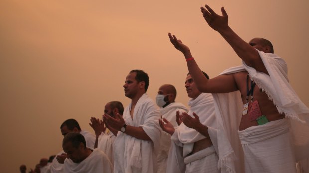 Muslim pilgrims pray during the Haj.