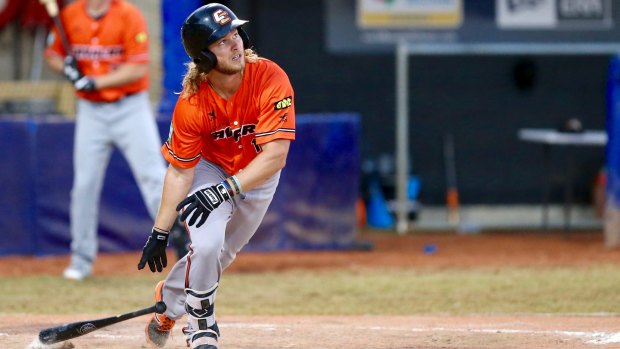 Canberra Cavalry shortstop River Stevens hitting a home against the Sydney Blue Sox