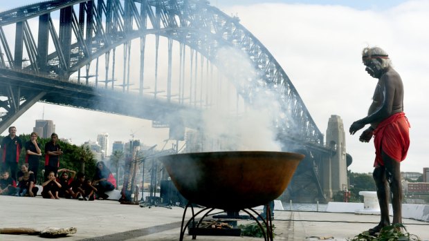 Uncle Max Eulo performs the smoking ceremony in 2016.