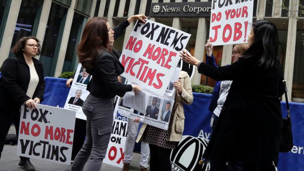 Protesters outside the News Corporation headquarters, in New York.