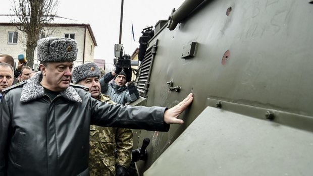 Ukraine's President Petro Poroshenko visits a training centre of the Ukrainian National Guard outside Kiev.